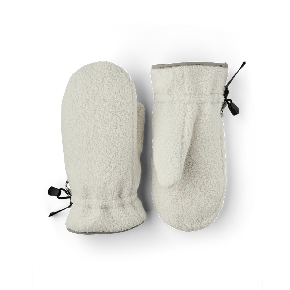 White machine-sewn mitten in shaggy teddy fleece