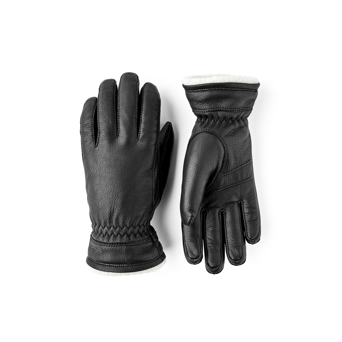 Black machine-sewn deerskin glove with white trim
