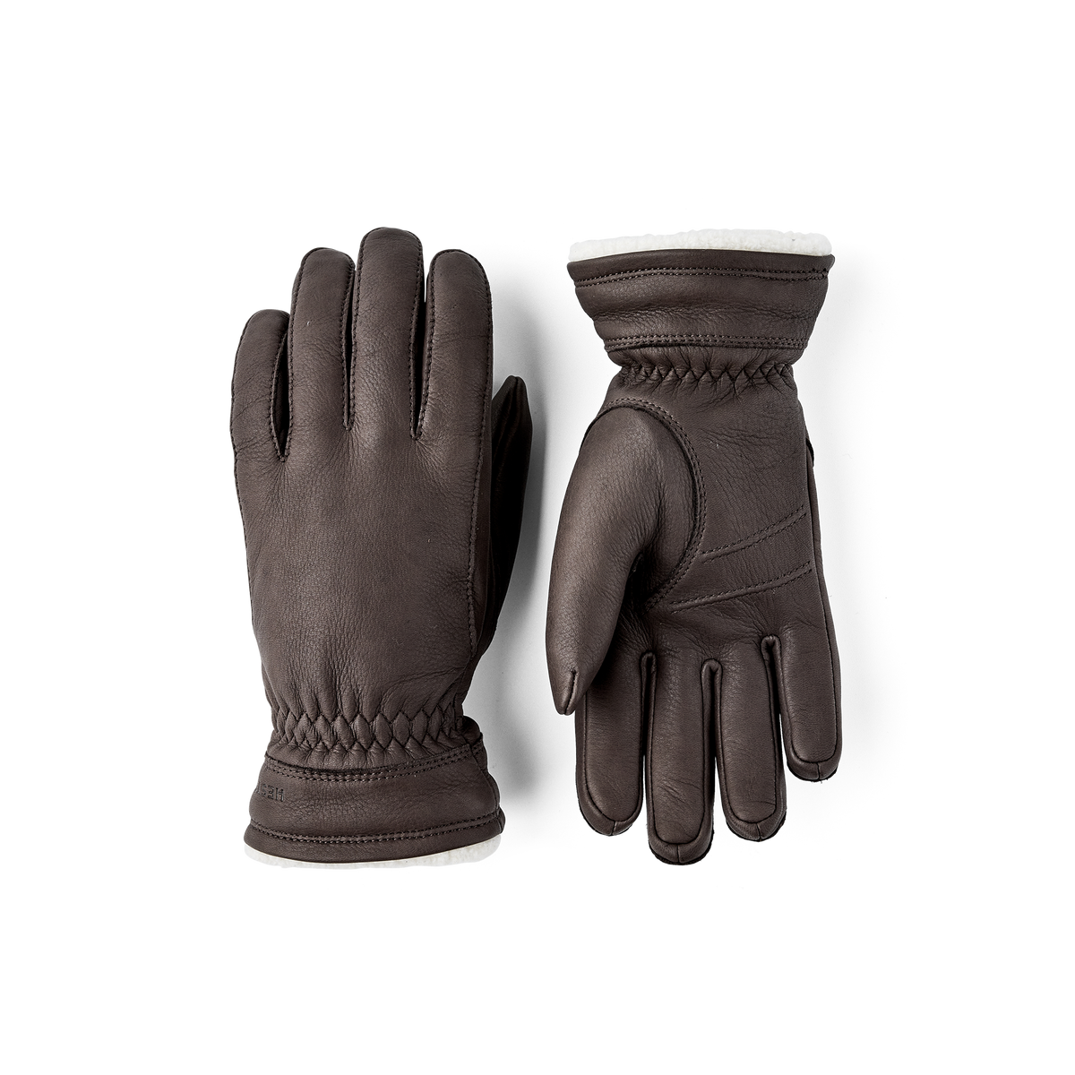 Dark brown machine-sewn deerskin glove with white trim
