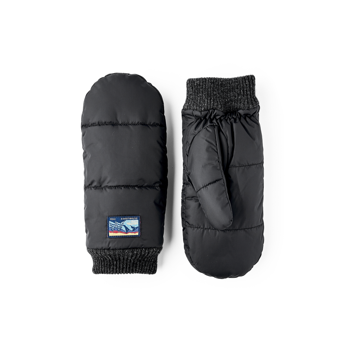 Black fabric mitten with knitted cuff
