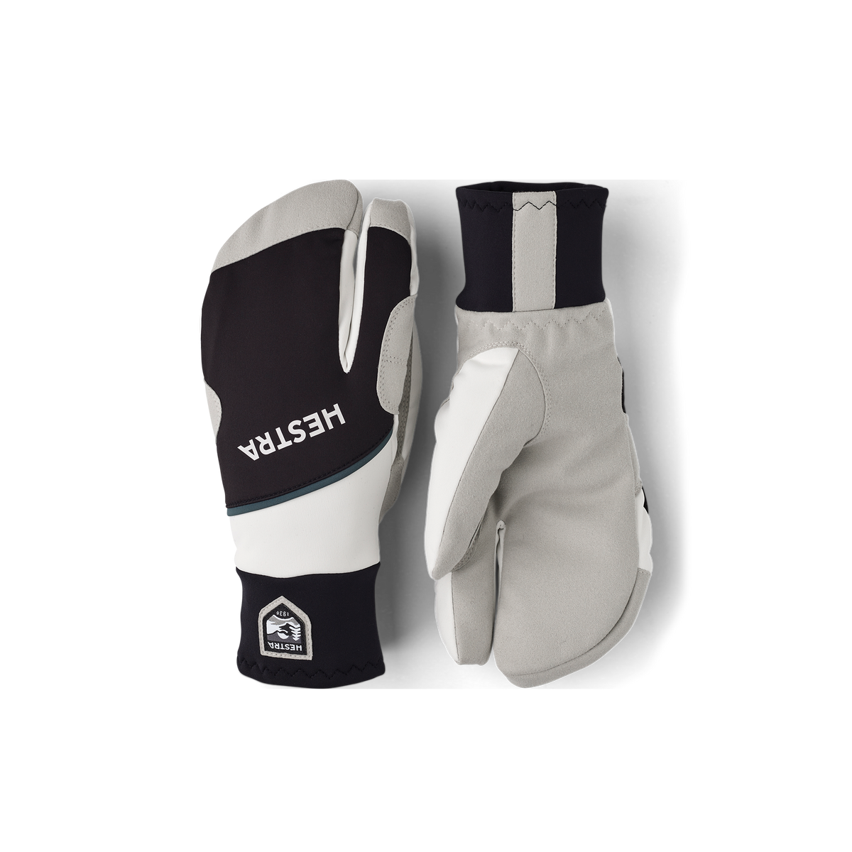 Black and white fabric three finger glove with gray synthetic suede palm