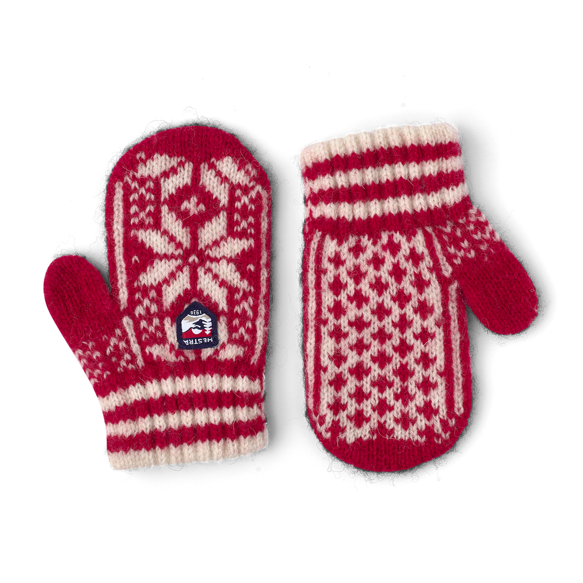 Red and white knitted mitten in wool blend