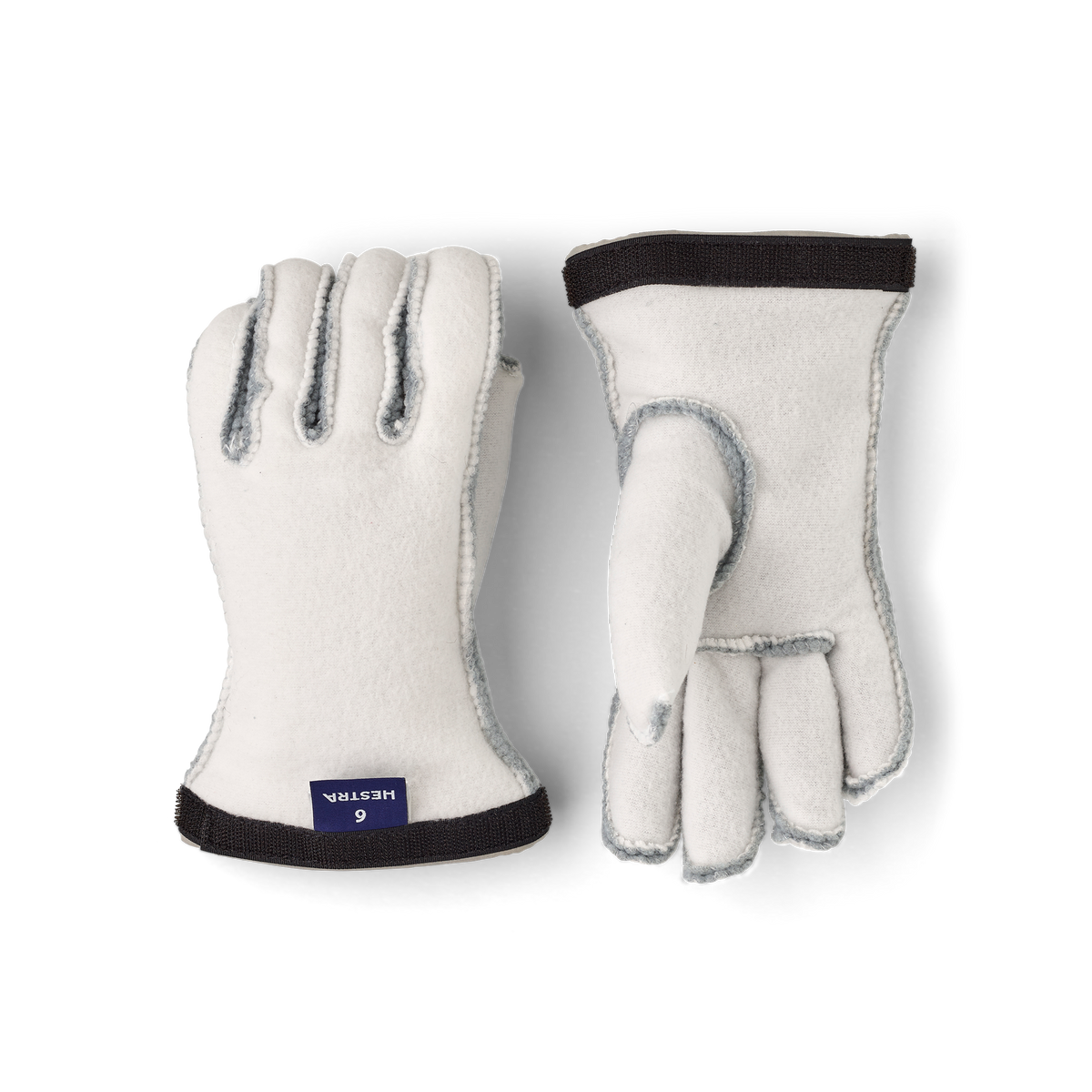 White machine-sewn liner glove